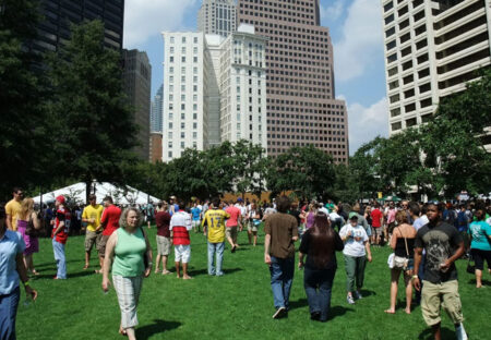 A group of people enjoy an urban park